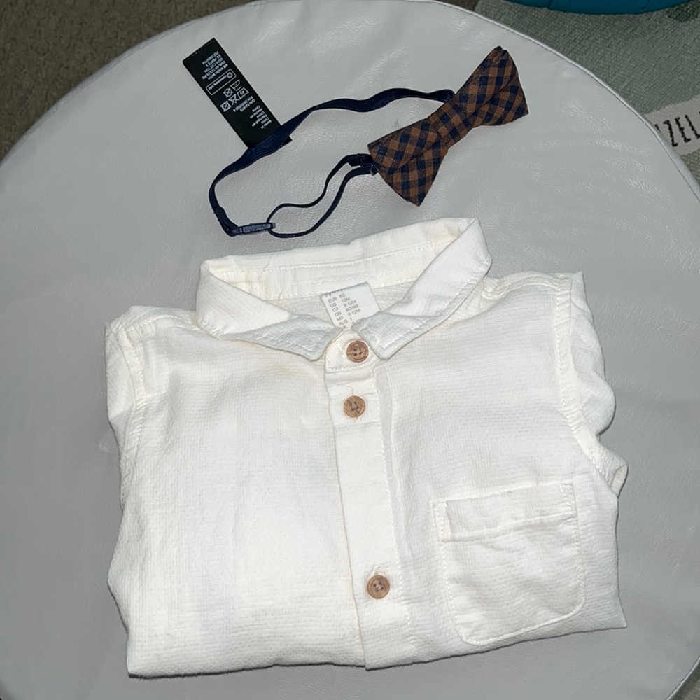 Long sleeved button down shirt with bow tie